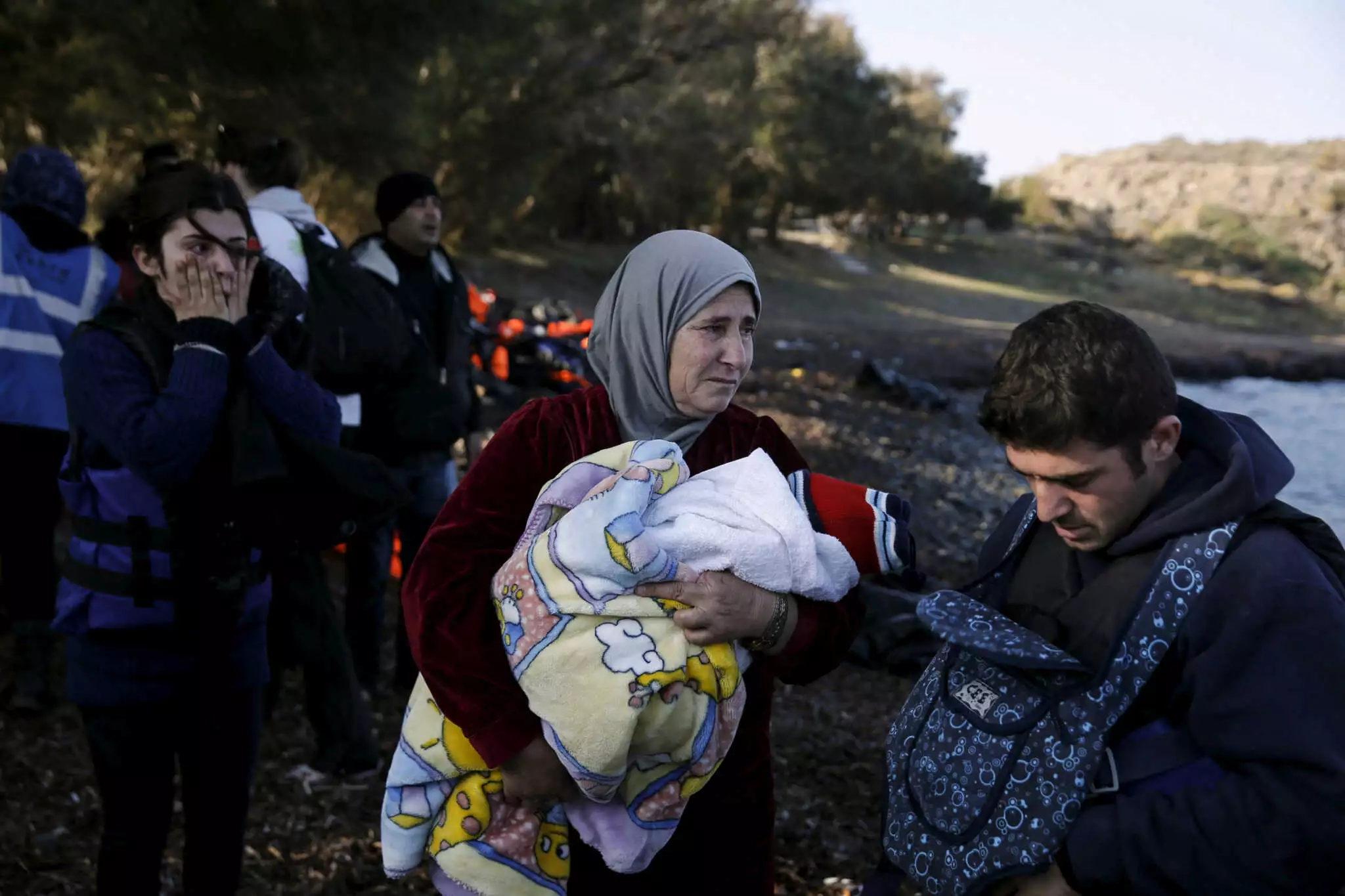 migrants reuters 2048x1365