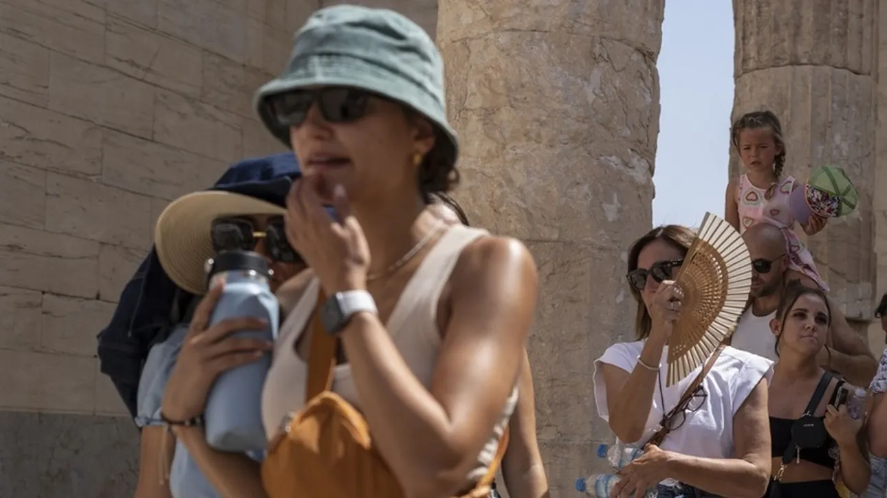 touristes kausonas
