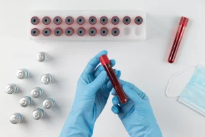 coronavirus arrangement with blood samples vaccine scaled